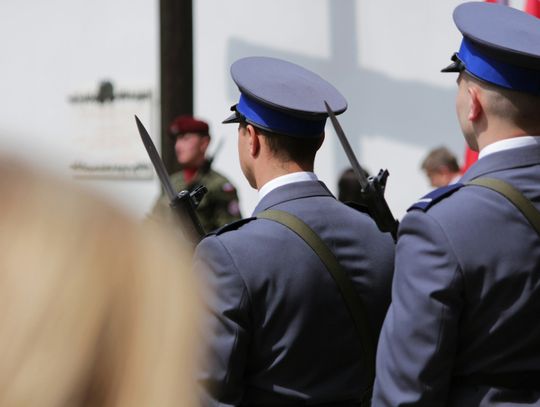 a group of men in uniform standing next to each other