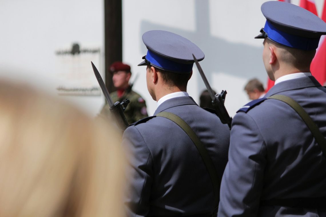 a group of men in uniform standing next to each other